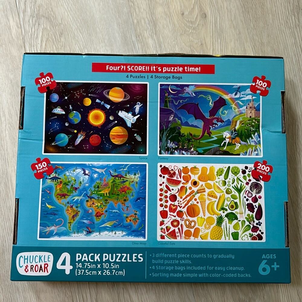 Chuckle and Roar 4 pack puzzles age 6+ new in box never opened mixed themes NWT